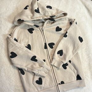 H&M Cream Hoodie with Black Heart Pattern